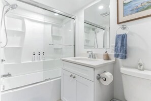 Hair dryer, towels, soap, toilet paper
