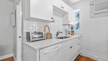 Condo, 1 Queen Bed (Flagler Suites 4) | Private kitchen | Oven