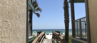 Beachfront corner unit with breathtaking ocean views!