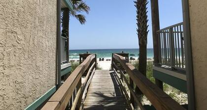 Beachfront corner unit with breathtaking ocean views!