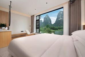 Superior Double Room, Lake View | Living area | TV, smart speakers, printers - Hidden Dragon Villa (Guilin)