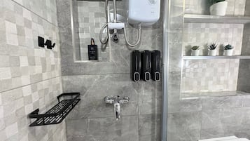 Shower, hair dryer, towels