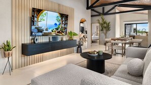 A modern living room with a large flat-screen TV mounted on a wooden wall, a black console table, a round coffee table, and a seating area with sofas and a dining table.