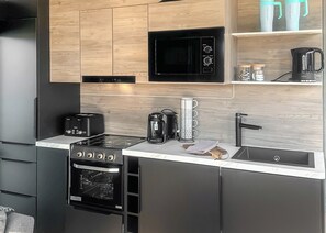 Refrigerador, horno, parrilla de estufa y tostadora 