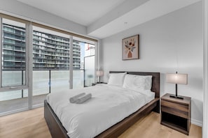 2 bedrooms, blackout curtains, soundproofing, iron/ironing board
