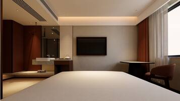 A modern hotel room with a large bed, a bedside table, a mirror, a wall-mounted TV, and a window with curtains.