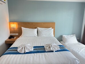 Habitación triple Deluxe | Escritorio, espacio para trabajar con un portátil, wifi gratis