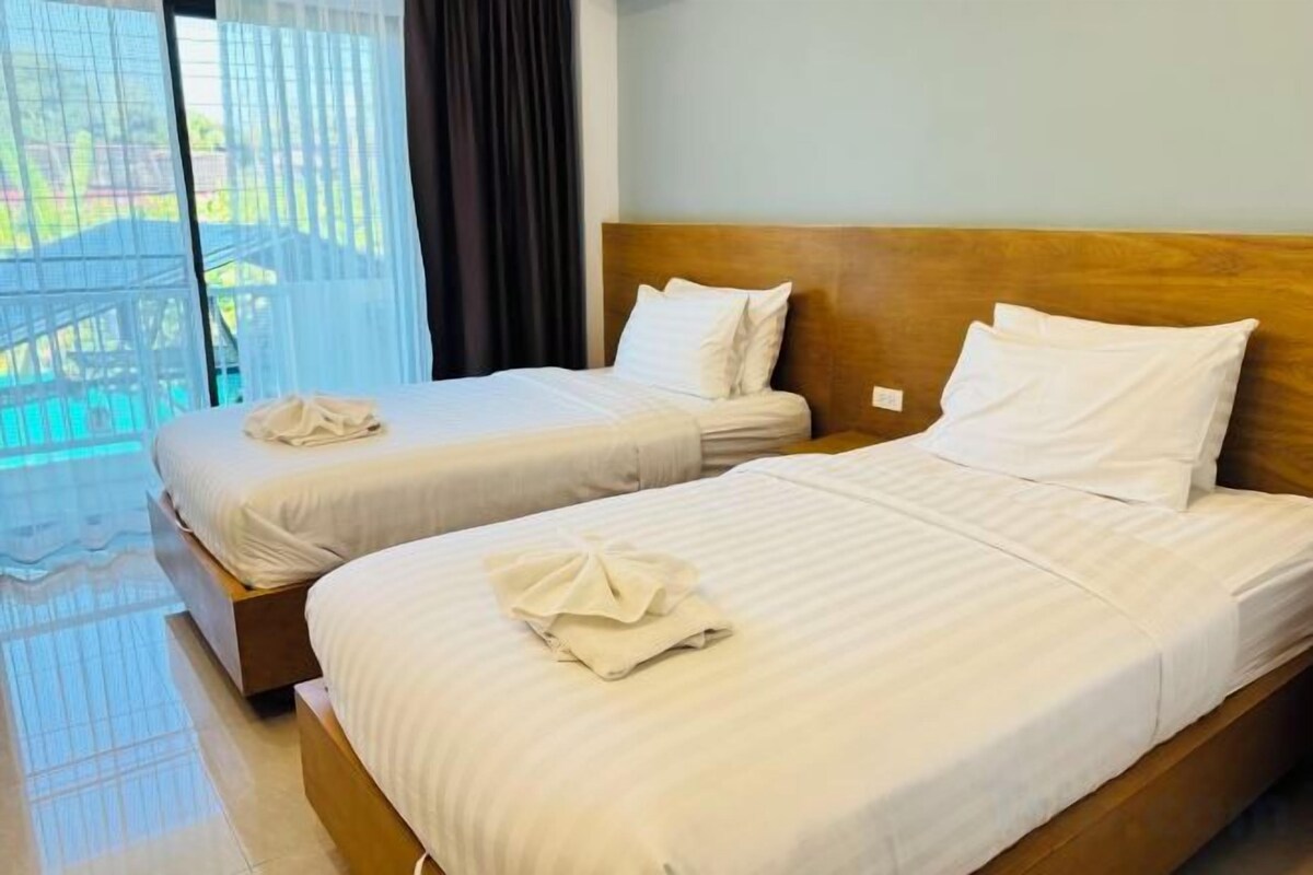 Desk, laptop workspace, free WiFi, bed sheets