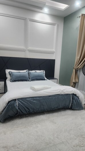 2 habitaciones, caja de seguridad en la habitación y escritorio 