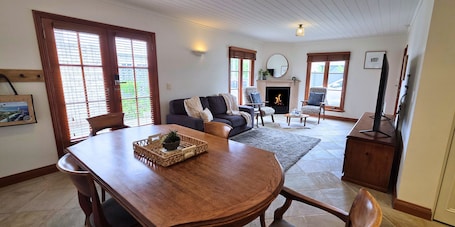 Deluxe Apartment, Courtyard View | Living area | 40-cm Smart TV with digital channels