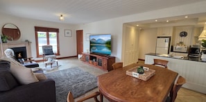 Deluxe Apartment, Courtyard View | Living area | 40-cm Smart TV with digital channels - Sandstone Suites (Port Fairy)