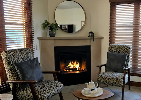 Deluxe Apartment, Courtyard View | Living area | 40-cm Smart TV with digital channels