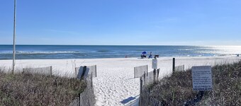 Gulf front condo with onsite snack bar, three shared pools, and internet