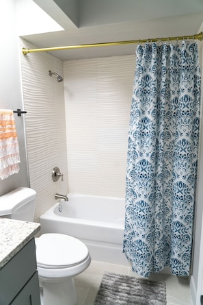 Hair dryer, towels, soap, shampoo