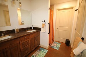 Shower, towels, soap, toilet paper