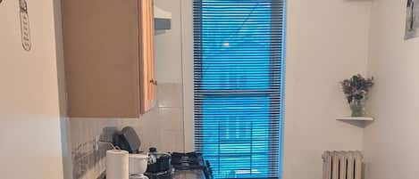 Fridge, stovetop, coffee/tea maker, electric kettle