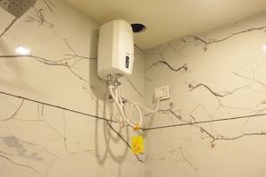 Shower, free toiletries, towels, soap - Hotel NS Residency  (Ahmedabad)