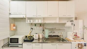 Fridge, coffee/tea maker, electric kettle, toaster