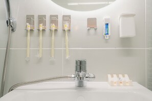 Hair dryer, towels, soap, shampoo