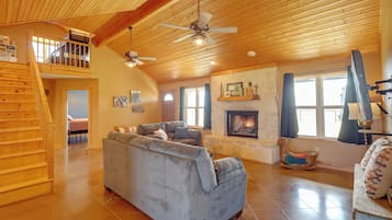 TV, fireplace, books