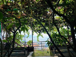 Quarto grand | Vista para o jardim