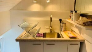 Interior - The colors of Commarin 2-bedroom apartment with kitchen. (Commarin)