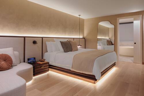 Premium bedding, down comforters, pillowtop beds, free minibar