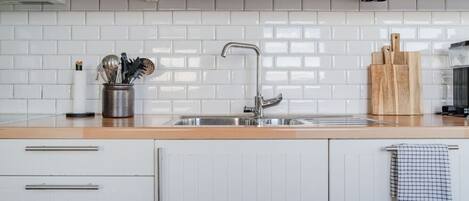 Fridge, microwave, stovetop, cookware/dishes/utensils