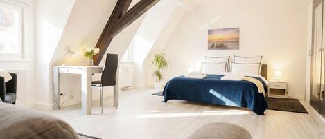 1 bedroom, desk, iron/ironing board, travel crib