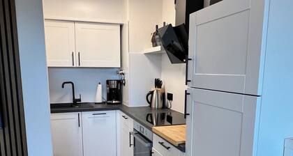 Family-friendly apartment right by the ski lift and hiking trail with swimming pool and sauna
