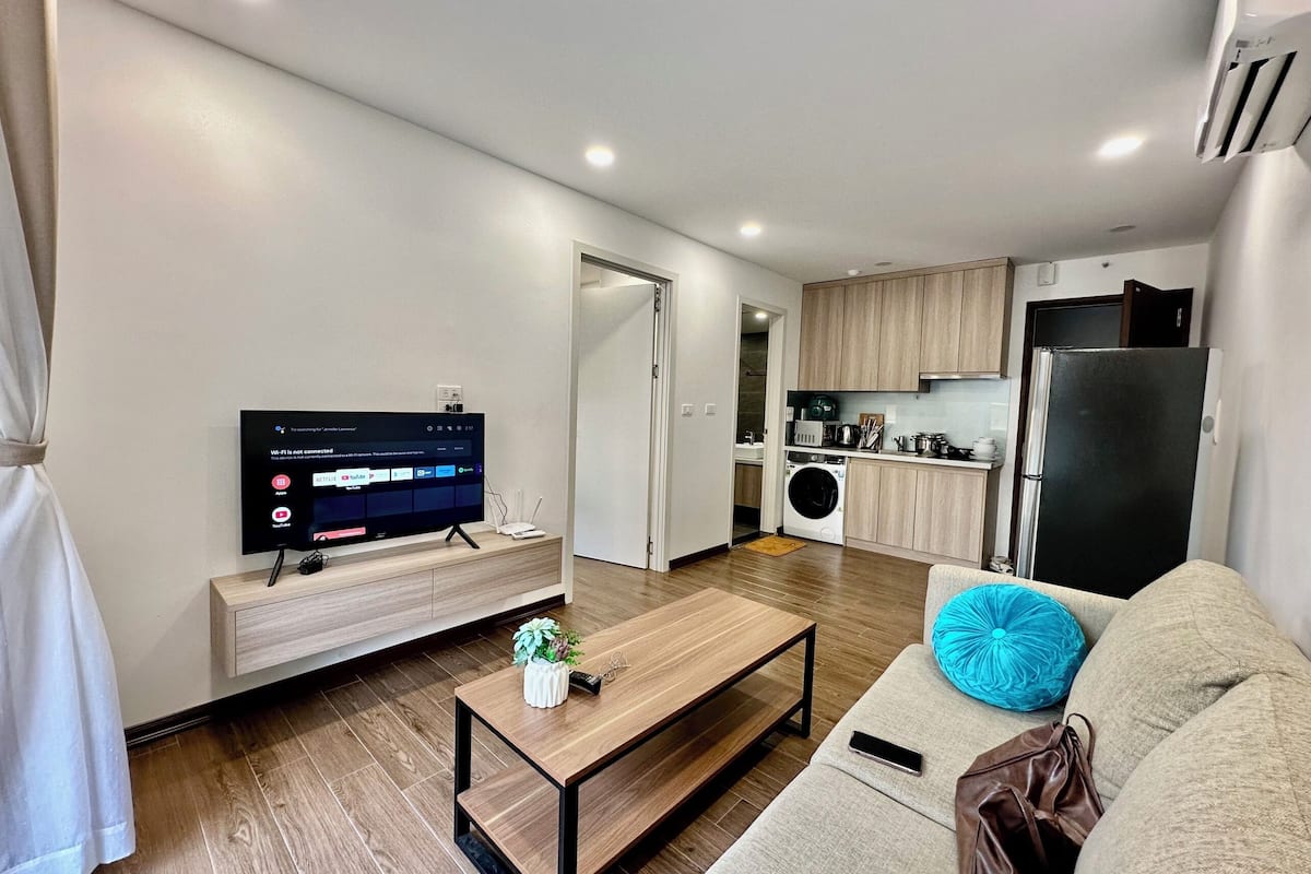 Standard Apartment, City View | Living area | 52-cm flat-screen TV with satellite channels