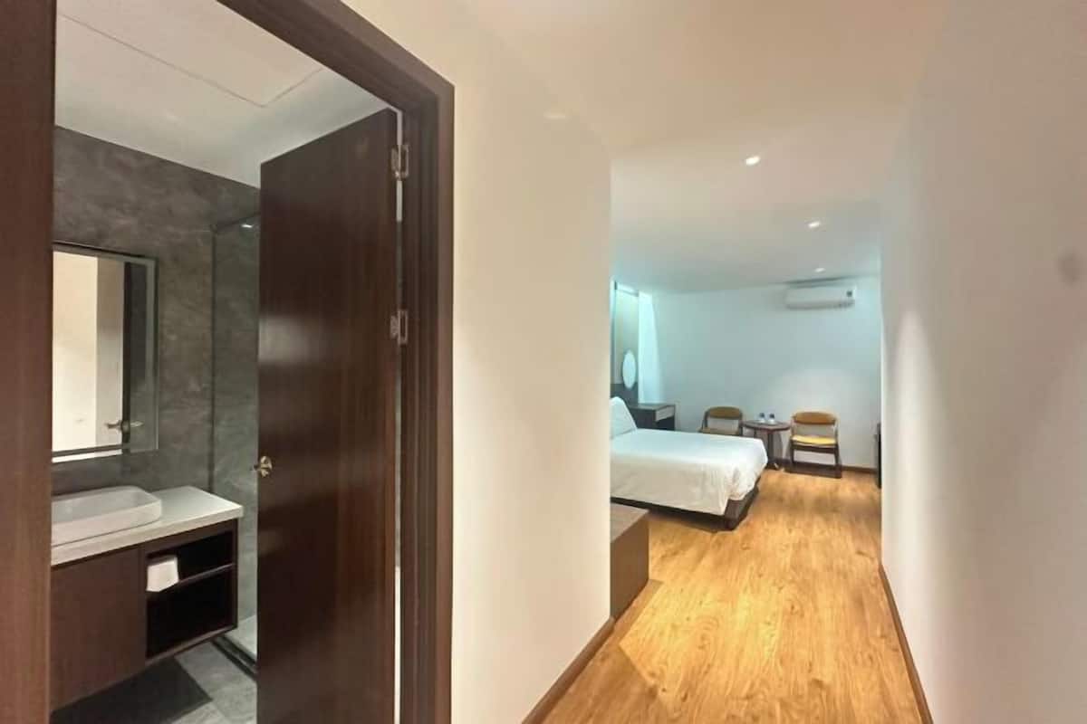2 dormitorios, ropa de cama de alta calidad, minibar y escritorio