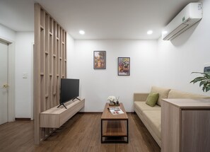 Habitació Deluxe, balcó | Roba de llit d'alta qualitat, minibar i escriptori 