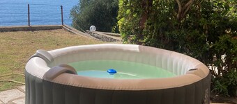 Apartment 'Paola' with Sea View, Private Garden and Air Conditioning