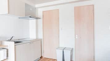 Fridge, microwave, electric kettle, cookware/dishes/utensils