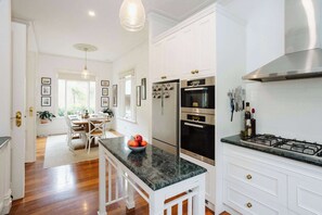 Fridge, microwave, oven, stovetop - Luxury Retreat: Pool, Fireplace & Parking (Lower Plenty)