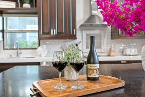 Fridge, microwave, oven, stovetop - Schatzi Haus - Home Theater, Pool, Close to Main (Fredericksburg)