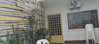 Two bedroom apartment with an outdoor balcony area facing the Mekong River.