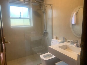 Shower, towels, soap, shampoo