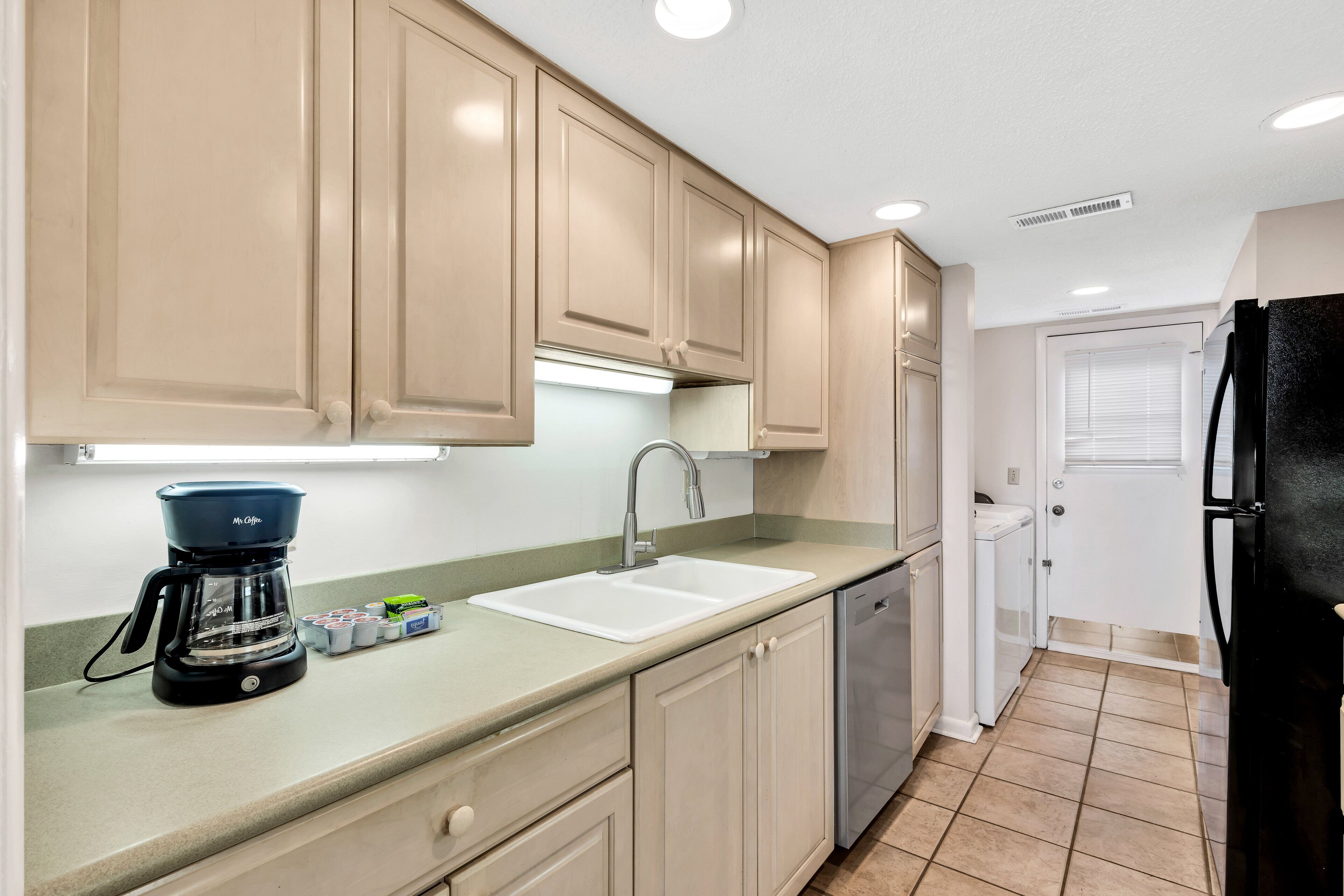 Well-equipped for all your needs, including full-sized refrigerator, oven, microwave, and coffee maker.