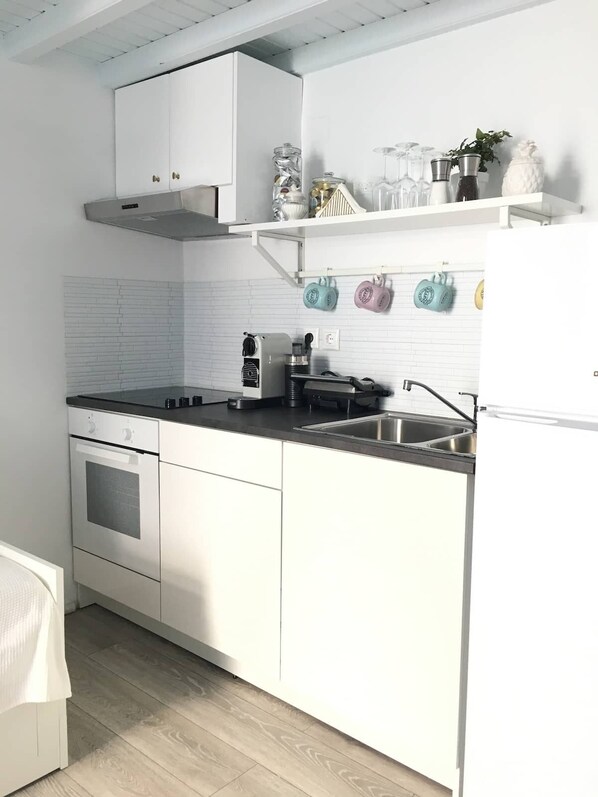 Fridge, oven, dining tables
