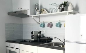 Fridge, oven, dining tables