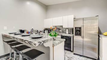 Apartment, 2 Bedrooms | Private kitchen | Fridge, oven, coffee/tea maker, toaster