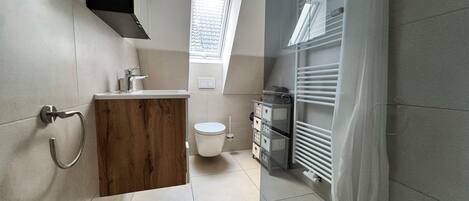 Hair dryer, towels, soap, toilet paper