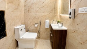 Shower, slippers, towels, soap - Aerovilla by JMD Group (New Delhi)