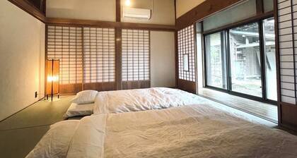 Totoro vibes, country side 120 year old house,10 adults. Beautiful and clean.