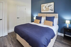 1 bedroom, desk, iron/ironing board, bed sheets