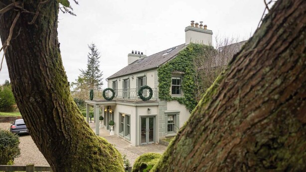 A two-story house with a balcony, a covered porch, and a driveway. - Private Country Residence, Made 4 Luxury Gathering (Newcastle West)