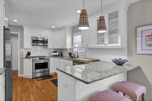 Fridge, microwave, oven, stovetop - Seasaw Cottage - 5 bedroom pet friendly home on Wrightsville Beach (Wrightsville Beach)