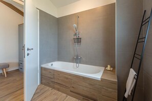 Shower, hair dryer, towels